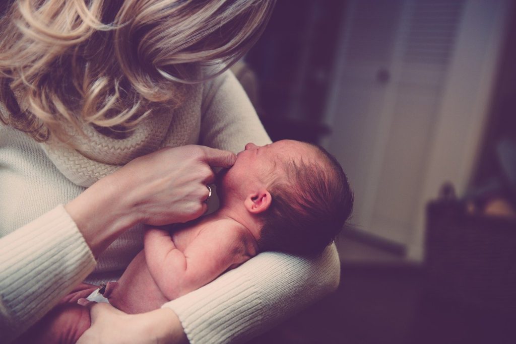 mommy holding baby, postpartum depression